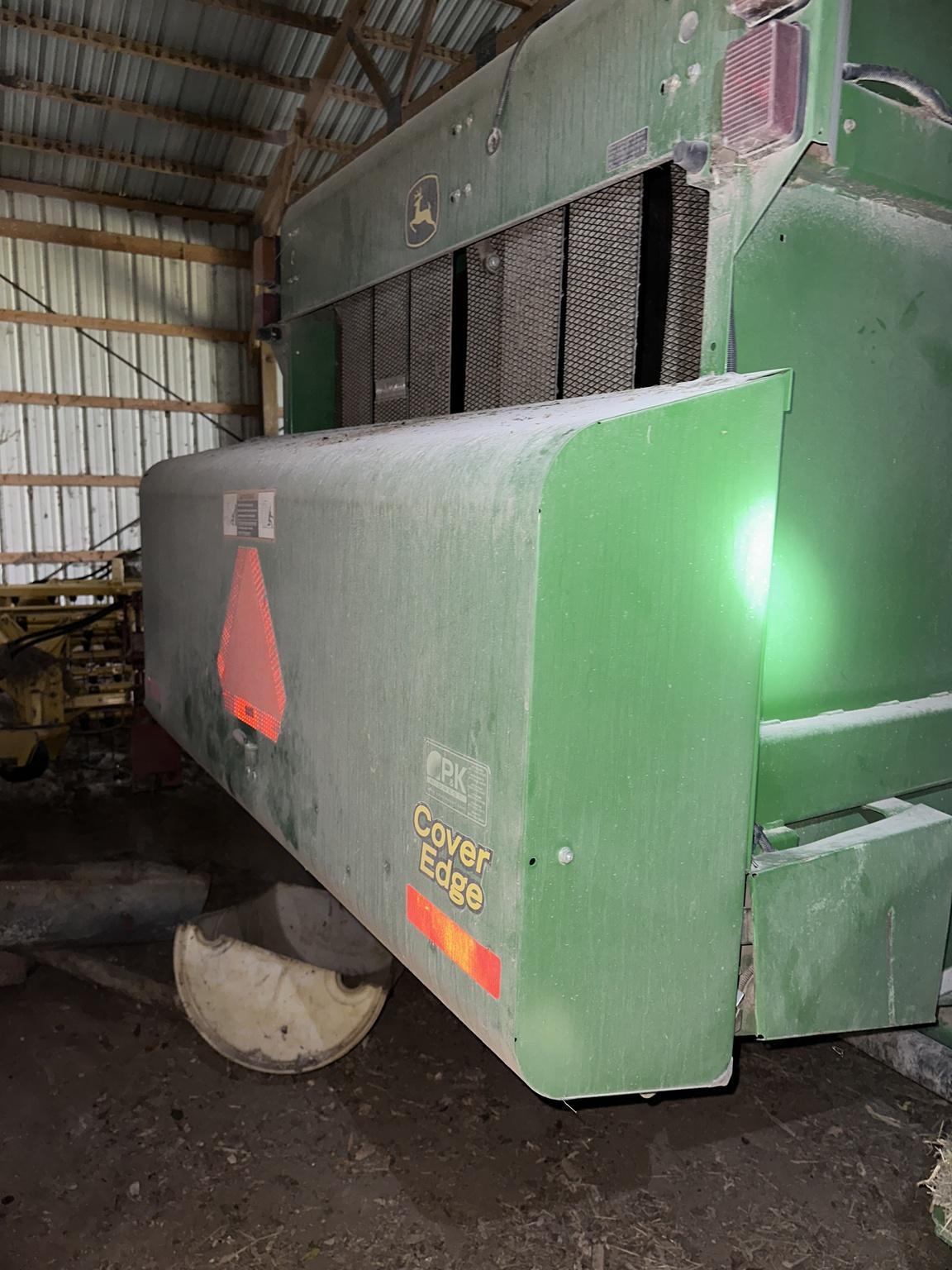 2013 John Deere 569 Premium Image