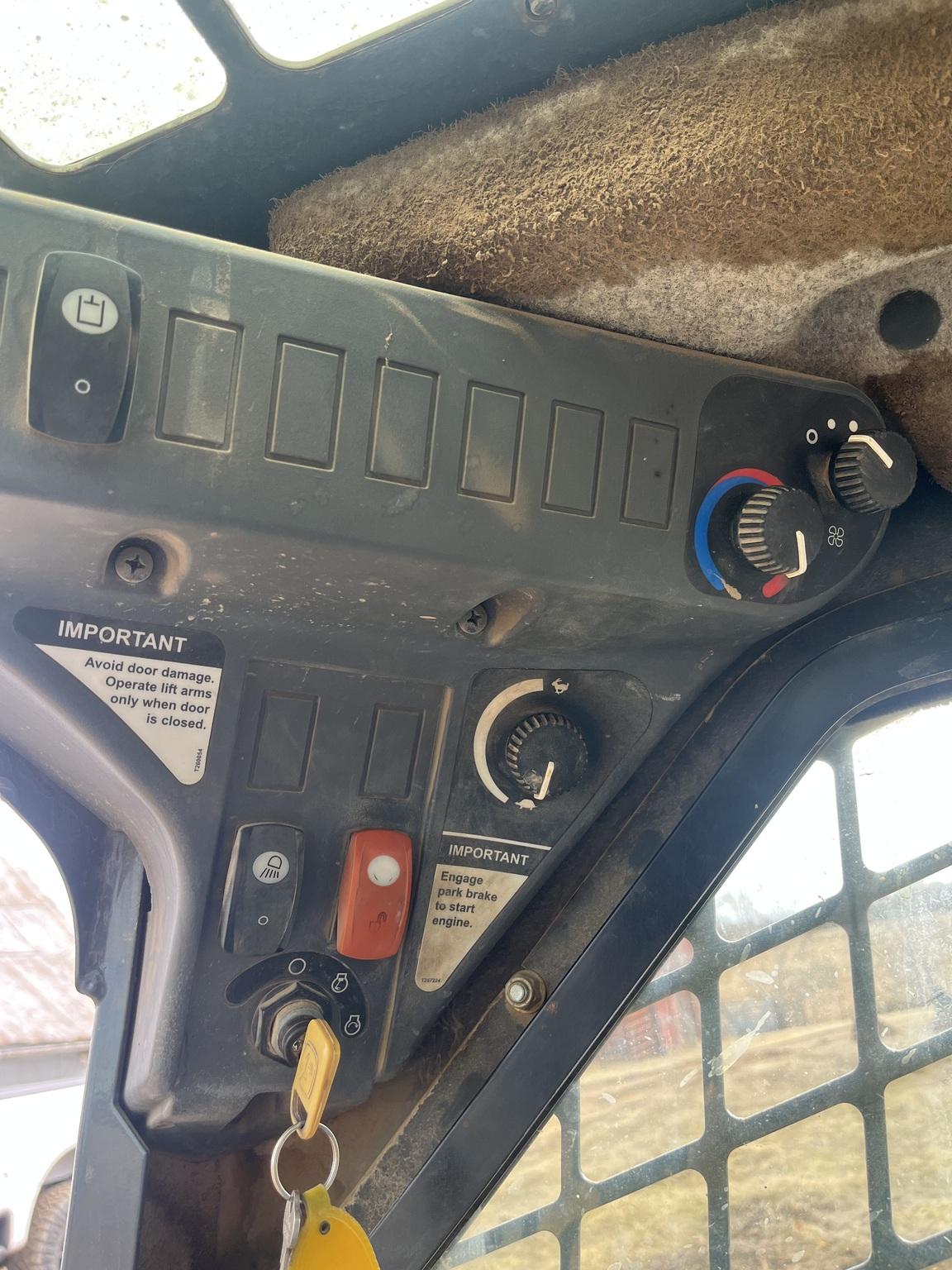 2012 John Deere 323D Image