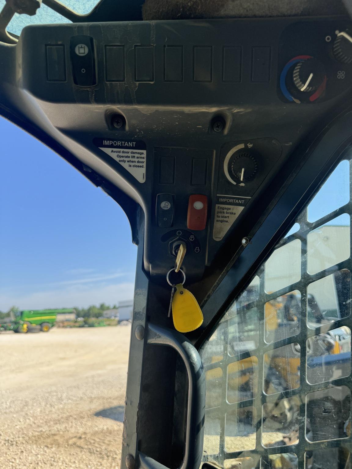 2012 John Deere 323D Image
