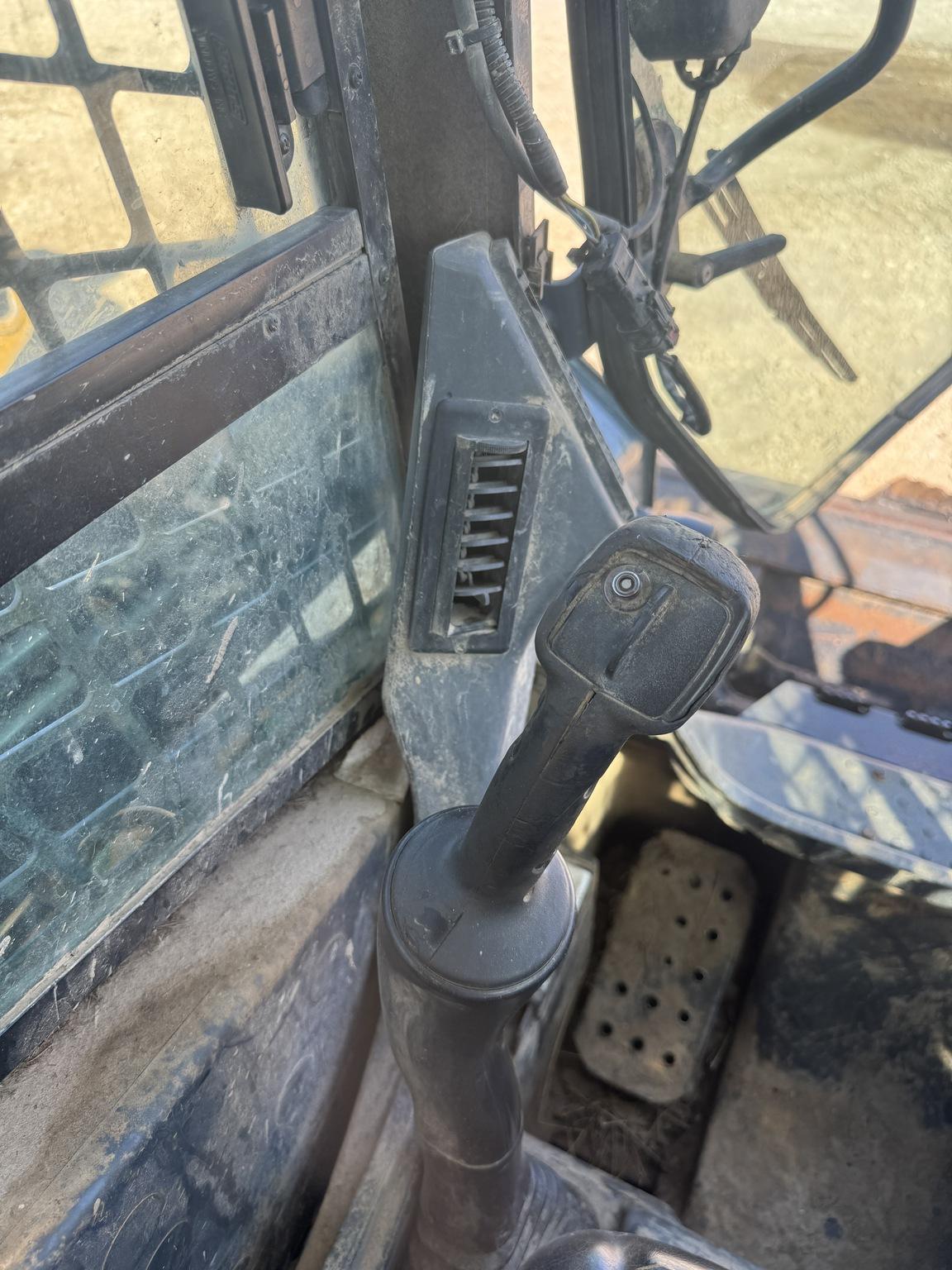 2012 John Deere 323D Image